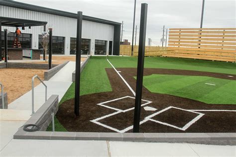 Home run dugout katy - Mar 28, 2023 · Home Run Dugout, a sports bar, restaurant and entertainment venue offering indoor soft-toss baseball, will open March 30 at 1220 Grand W. Blvd. in Katy. The 46,000-square-foot venue includes 12 ... 